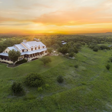 Aerial view of the MT7 ranch house at sunrise