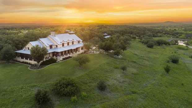 Aerial view of the MT7 ranch house at sunrise