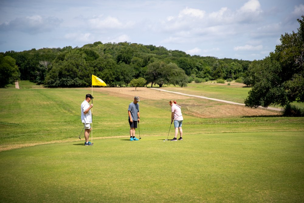 Golfers tee off at Lockhart State Park's golf course