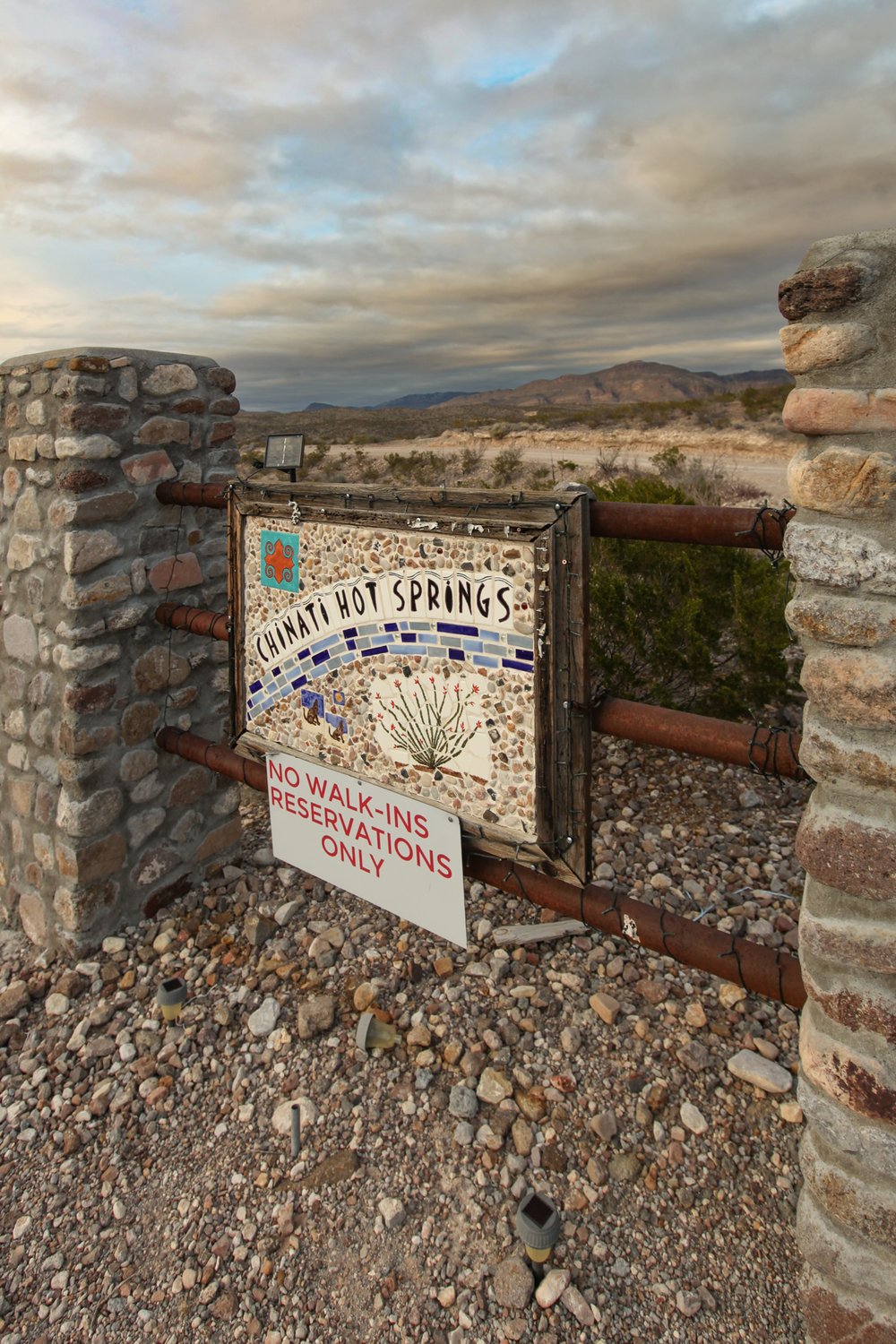 A sign greets visitors to Chinati Hot Springs