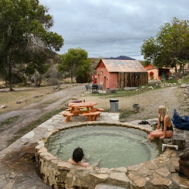 The waters of Chinati Hot Springs fill a large soaking pool