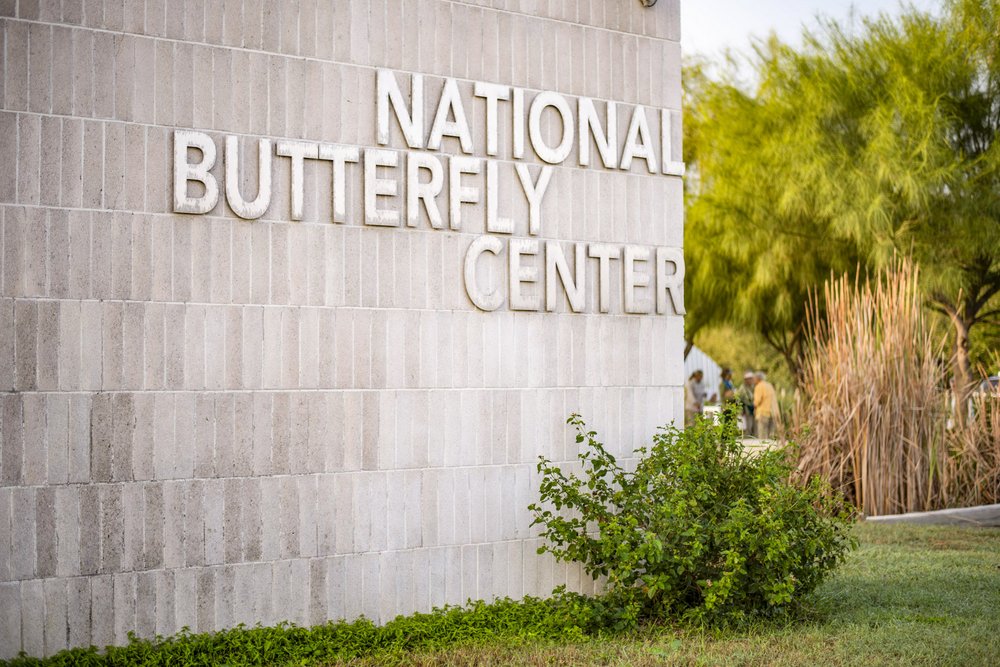 Large brick sign reading National Butterfly Center