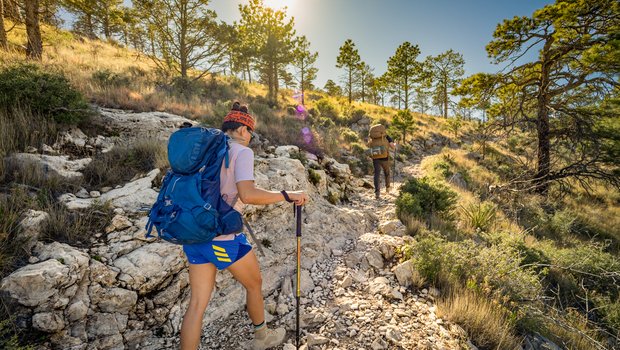 People backpacking through the Guadalupe Mountains.