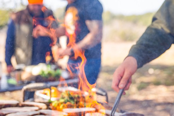 Hunter grilling game for hungry hunters.