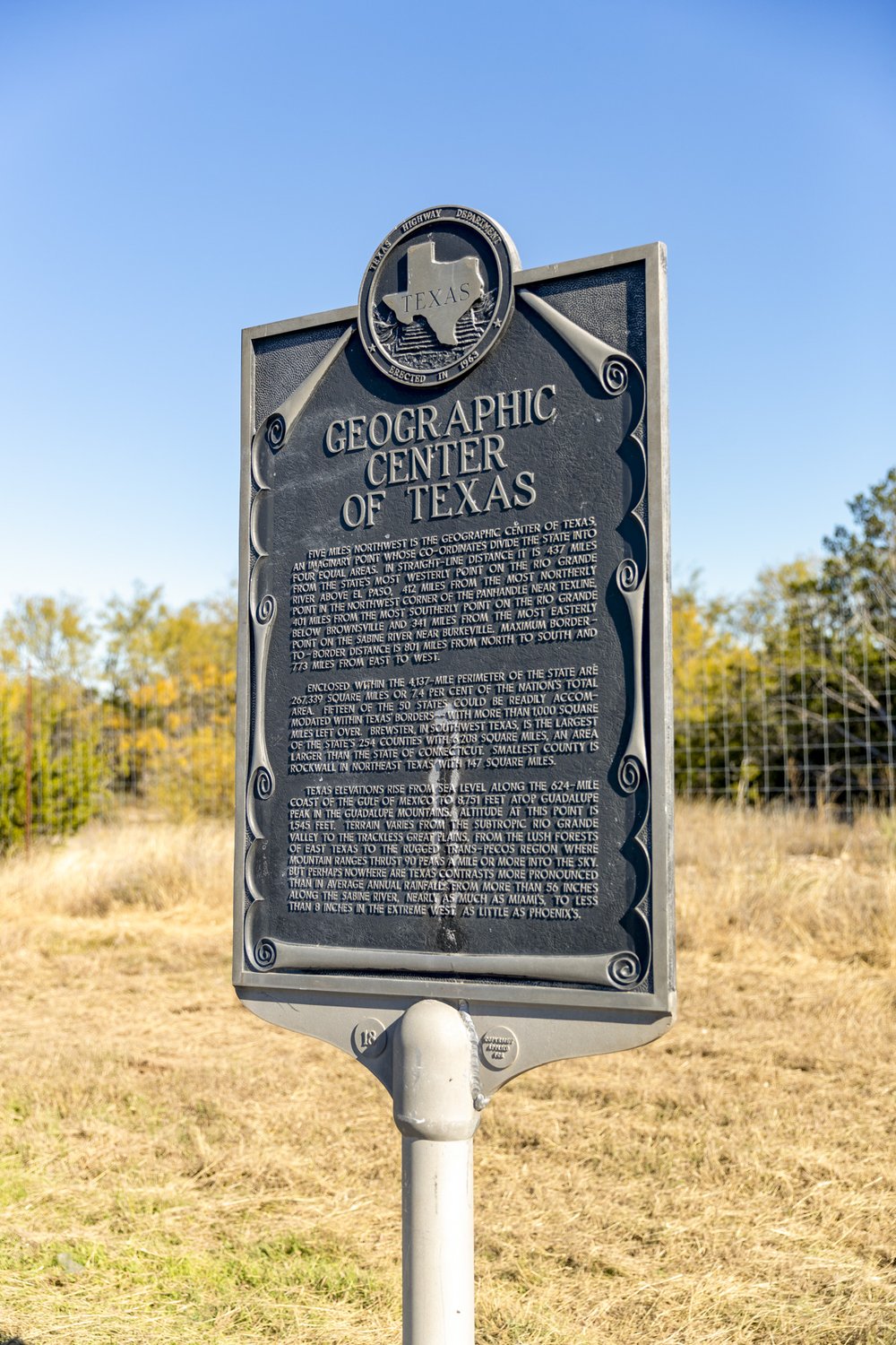 A historial marker sign proclaiming Brady the Geographical center of Texas