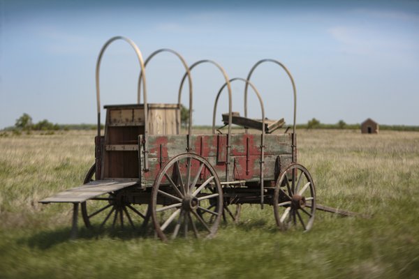 Covered Wagon in an open field.