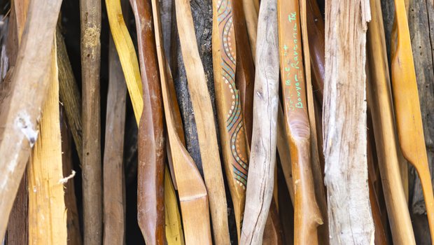 Wood lined up for making bows.