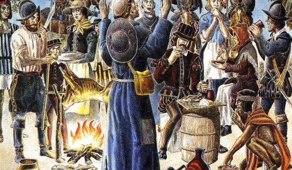 A painting of Spanish colonists and Native Americans having a feast.