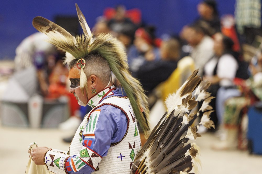 Man wearing Native American clothing at the annual Powwow at the Austin Convention Center.