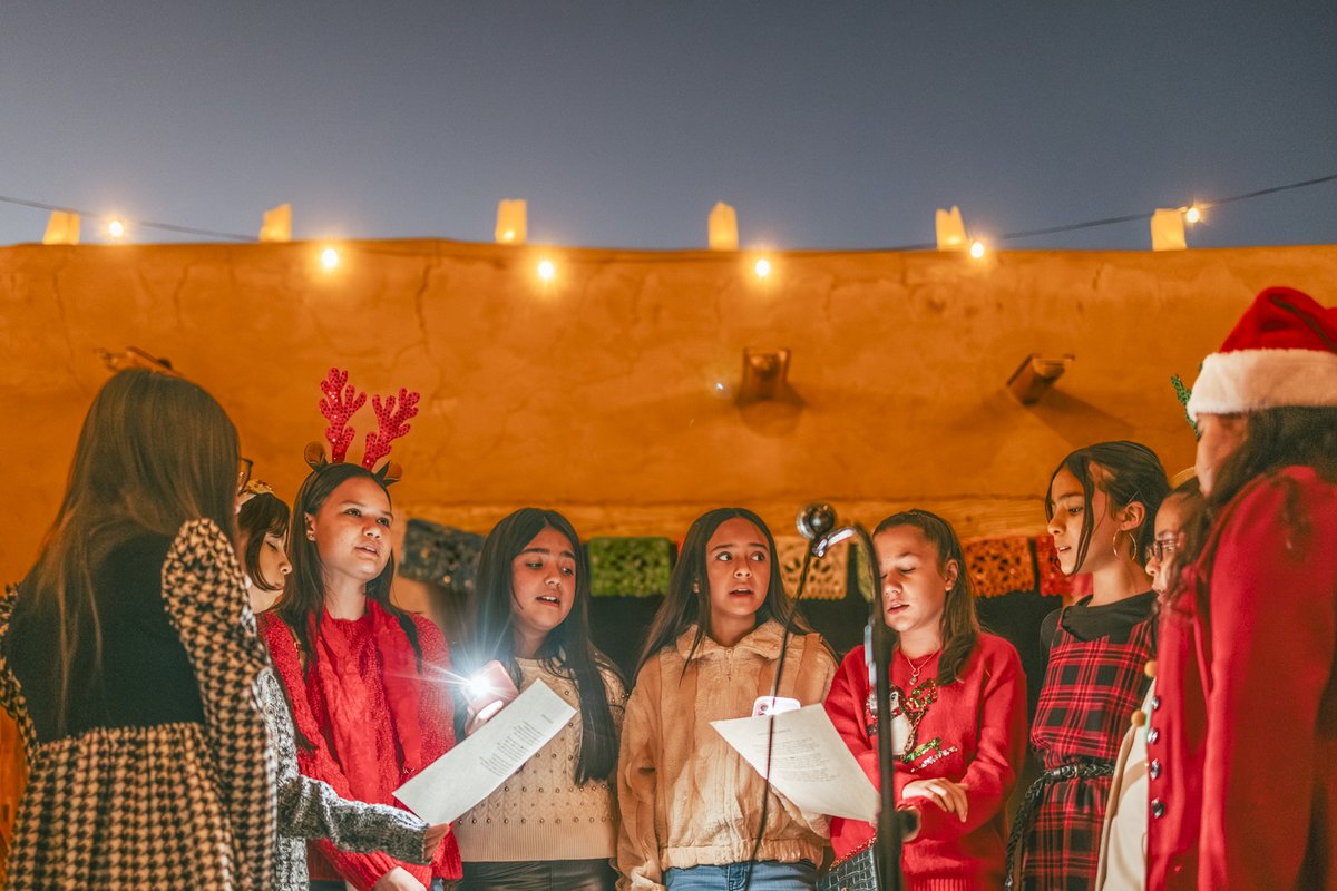 A youth choir singing at the Posada at Fort Leaton State Historic Site.