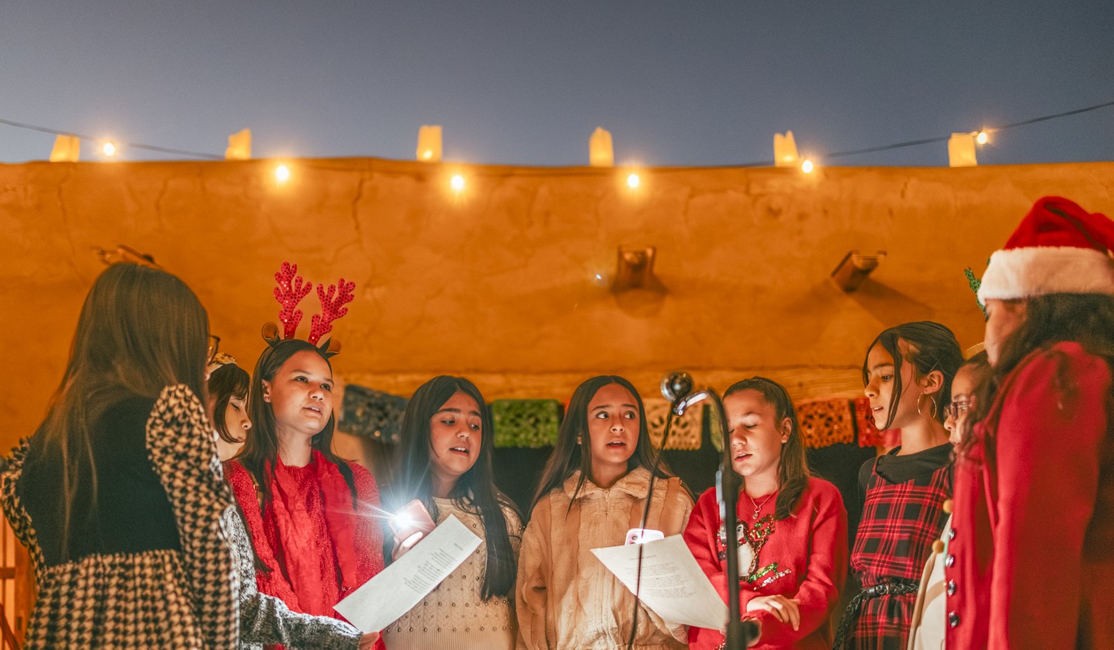 A youth choir singing at the Posada at Fort Leaton State Historic Site.
