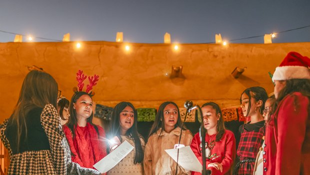 A youth choir singing at the Posada at Fort Leaton State Historic Site.