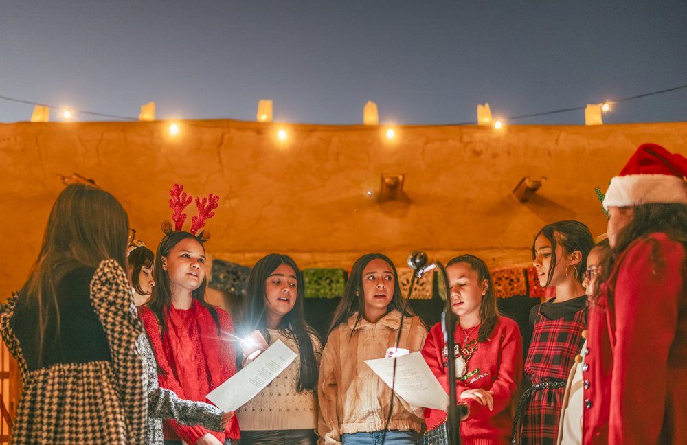 A youth choir singing at the Posada at Fort Leaton State Historic Site.