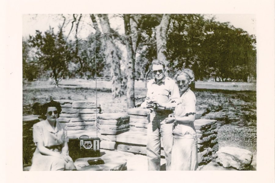 1943 Women Volunteers at Abilene State Park standing in front of benches