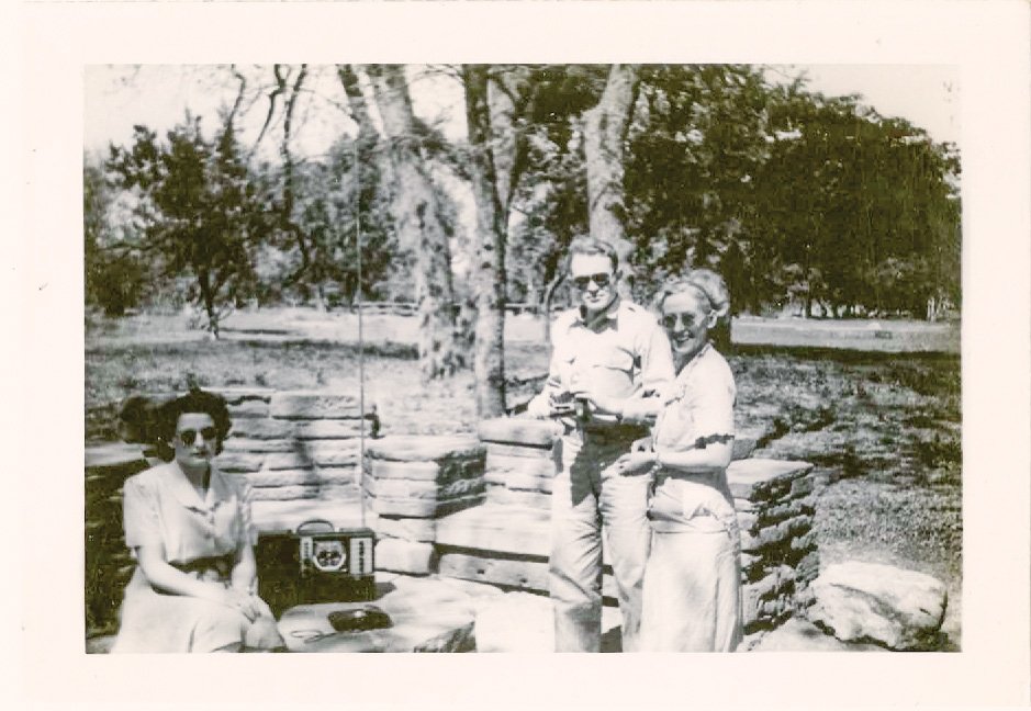 1943 Women Volunteers at Abilene State Park standing in front of benches
