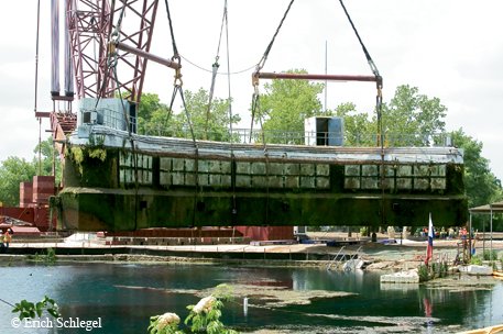 The Submarine Theater being pulled from the water of Spring Lake.