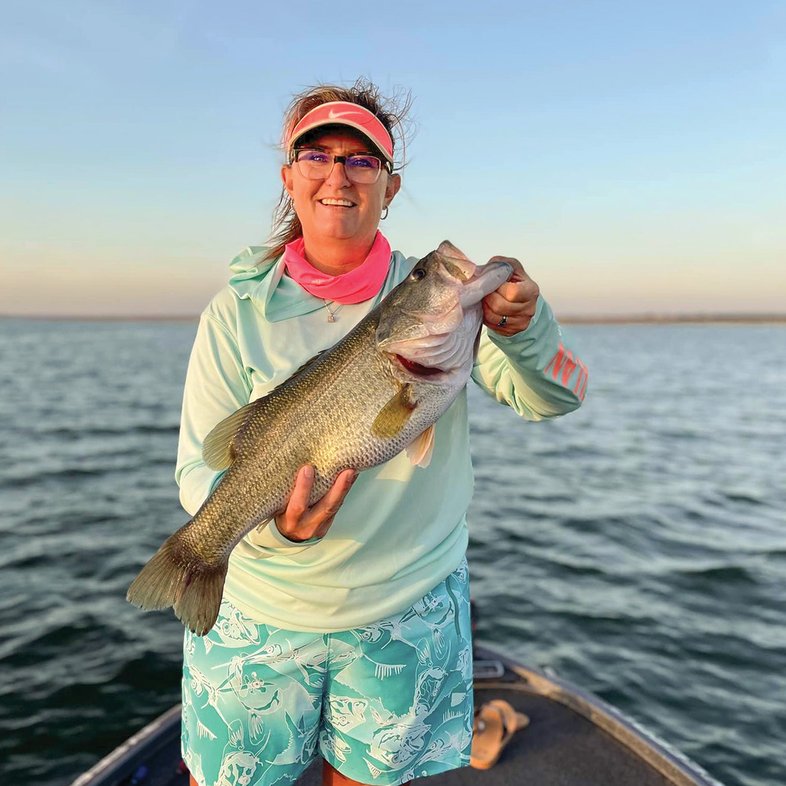 Mechelda Criswell holds a bass