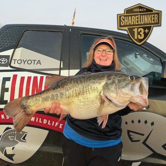 Mechelda Criswell holds bass Sharelunker Legacy #646