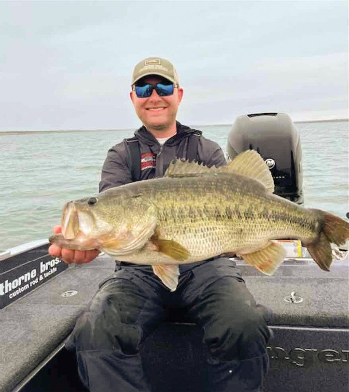Nolan Sprengeler holding bass Legacy Sharelunker #644