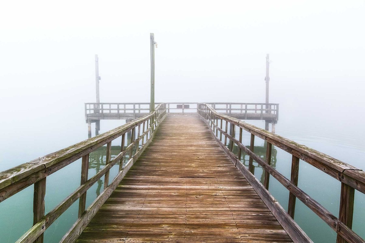 A fishing pier in the fog at Corpus Christi State Park