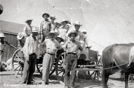 Abuelito Clemente family working in field 1945's  wagon