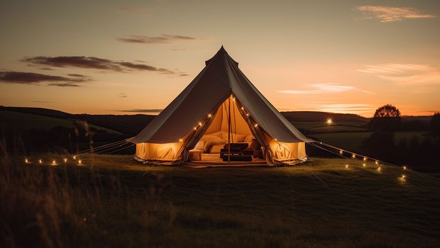 Cozy glamping tent with lights.