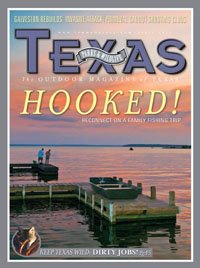 April 2010 Cover - Two fishing piers over the water with a sunset - Title: Hooked!