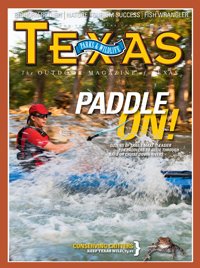 April 2011 Cover - Kayaker on rapids - Title: Paddle UN!