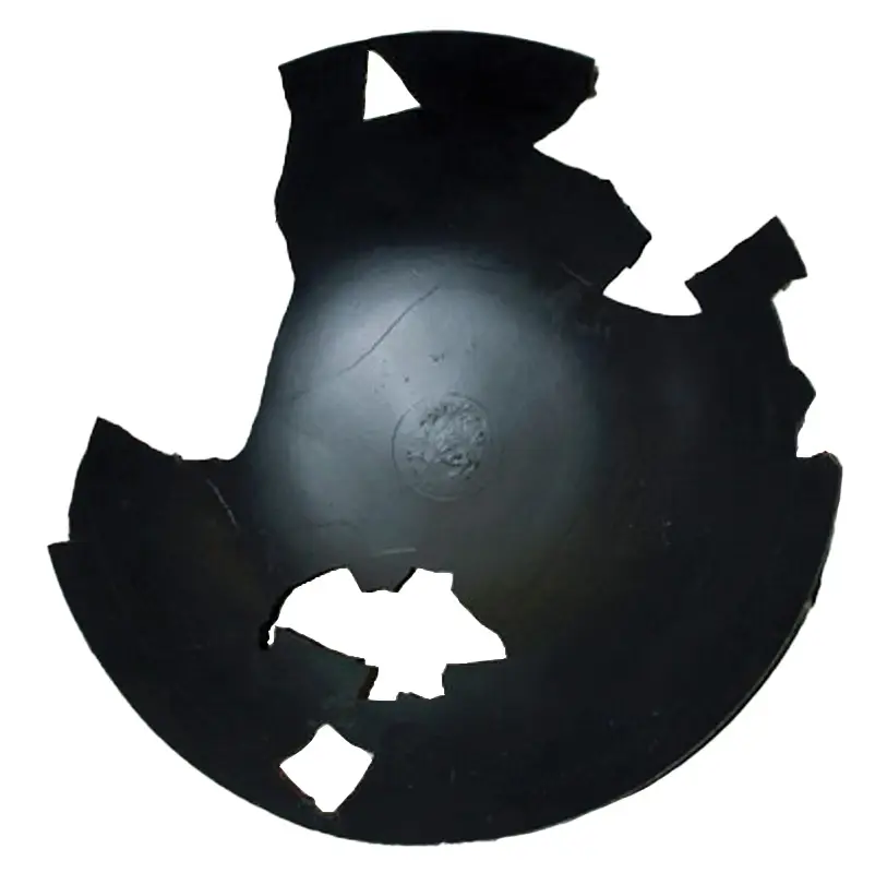 Black pieced together wok artifact with some pieces missing