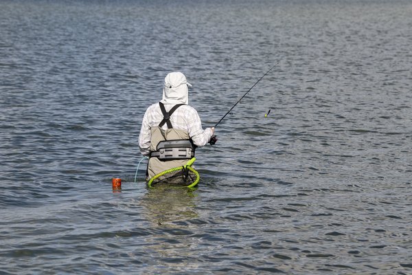 Man wade fishing in Baffin Bay