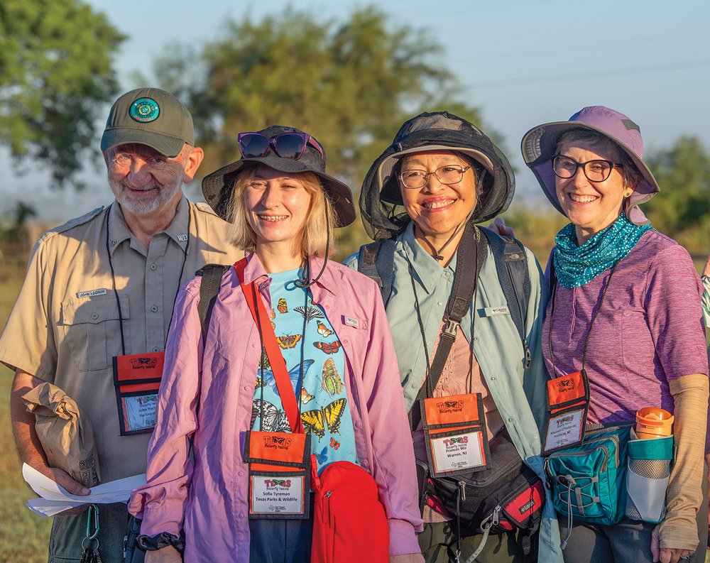 Friends gathered for a photo at the Butterfly Festival