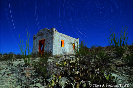 Contra­bando movie set structure with stars in the night sky