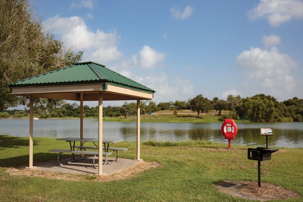 Covered table by the water at Lake Corpus Christi State Park