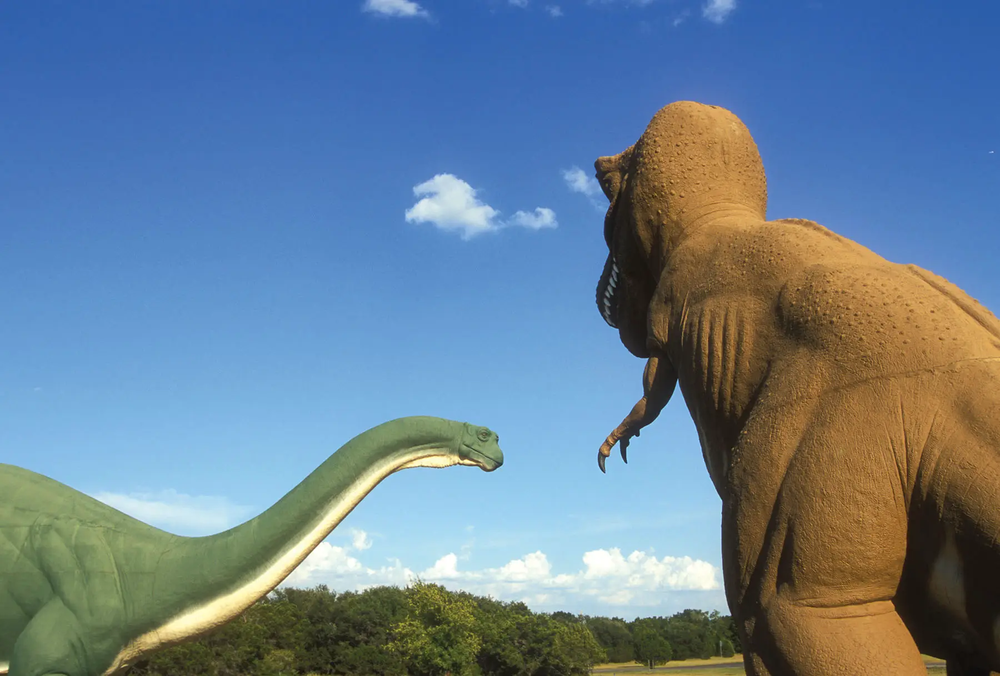 Dinosaur Valley statues keeping watch over Dinosaur Valley State Park