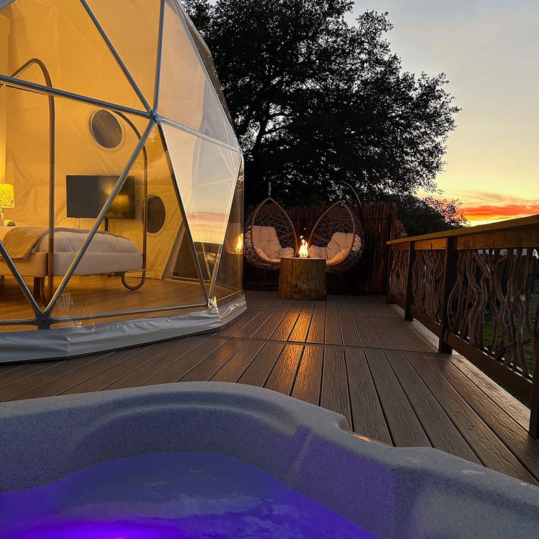 A dome tent at Elevation Ranch with a hot tub.