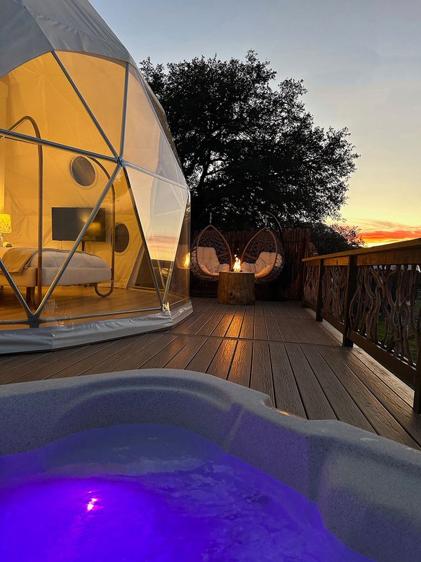 A dome tent at Elevation Ranch with a hot tub.