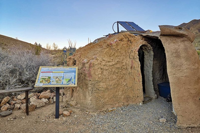 Franklin Mountains State Park blind looks like it was built to blend in to the rocky landscape with an info sign out front