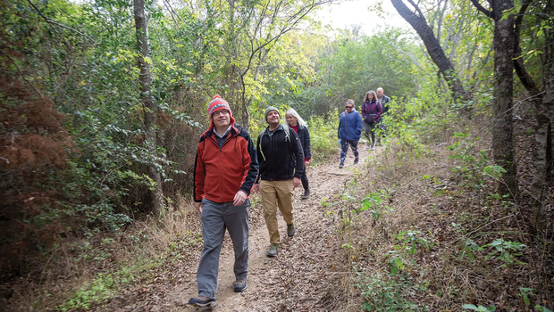 First Day Hikers walking down a Texas State park trail