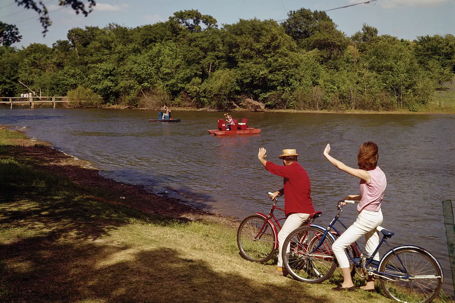 Fort Parker State Park with people bicycling and boating by Lake Fort Parker