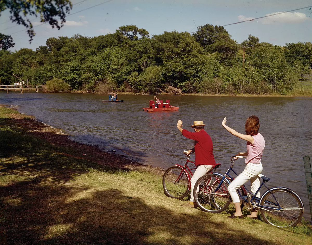 Fort Parker State Park with people bicycling and boating by Lake Fort Parker