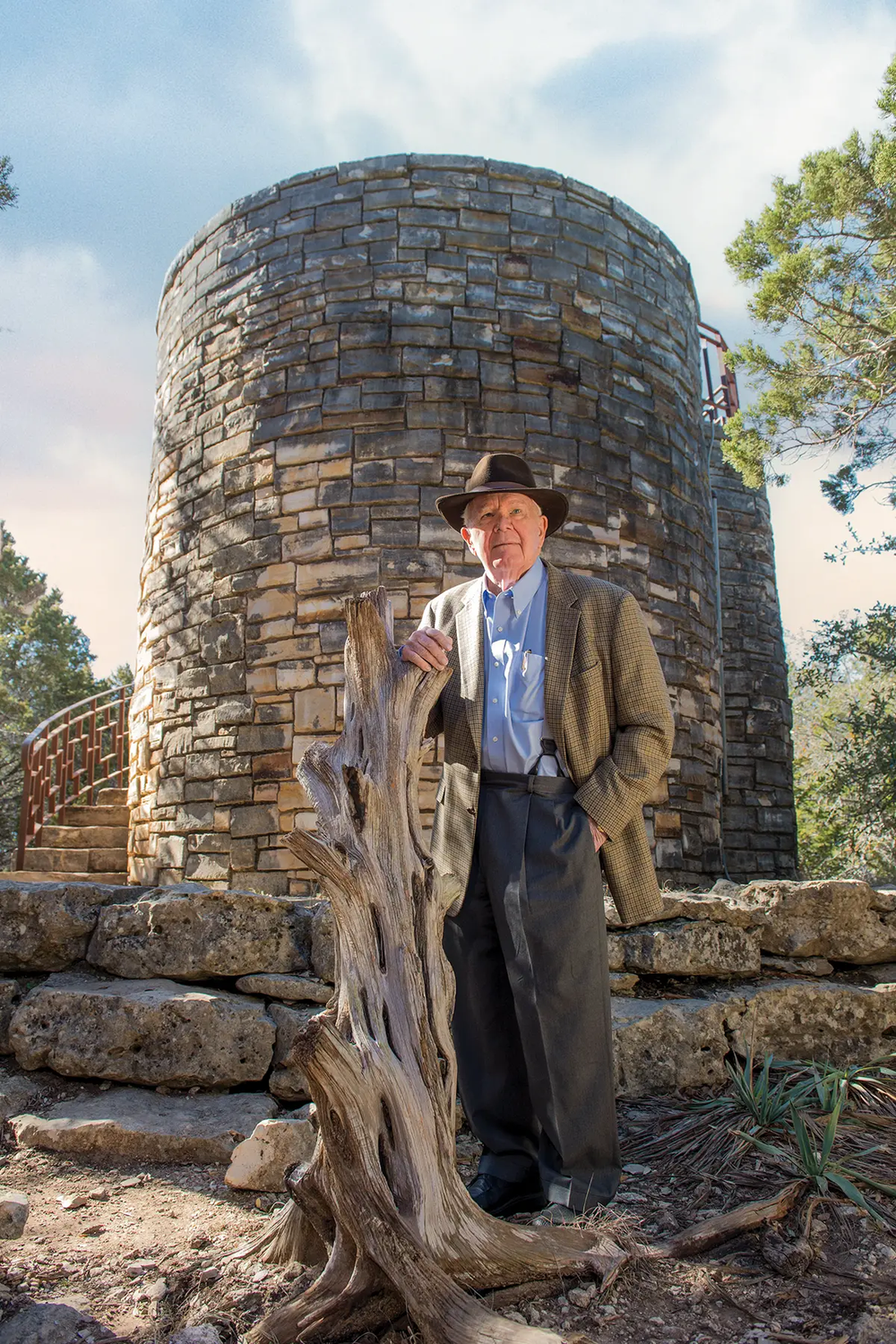 George Bristol standing in front of a stone structure at a state park
