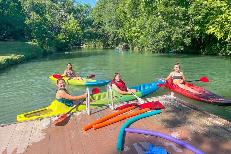 People in kayaks at Geronimo Creek Retreat