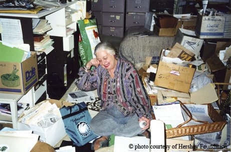 Terry Hershey surrounded by information she collected