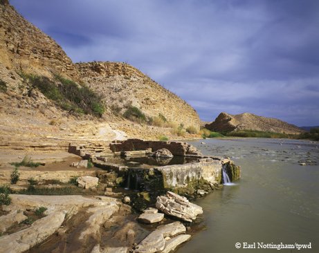 Rocky landscape leading into hot springs at Big Bend National Park