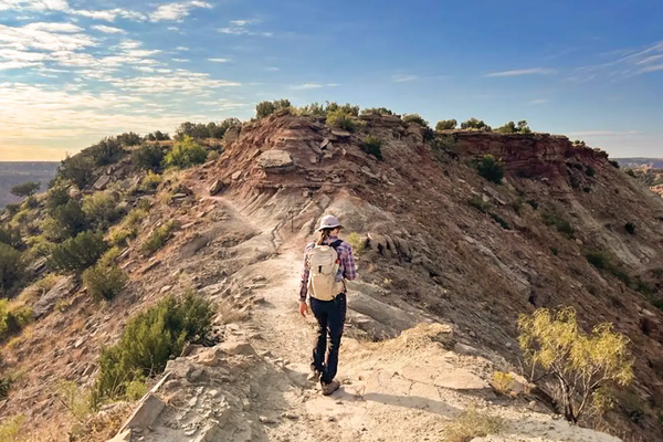 Hiker on the rim of Palo Duro Canyon