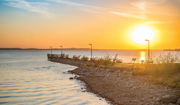 Sunrise at a peninsula at Ray Roberts Lake.