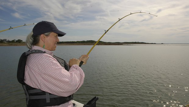 Woman fishing in Lake Buchanan for blue catfish