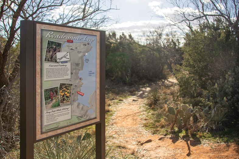Lake Colorado City State Park Trailhead with a sign showing information about the trail