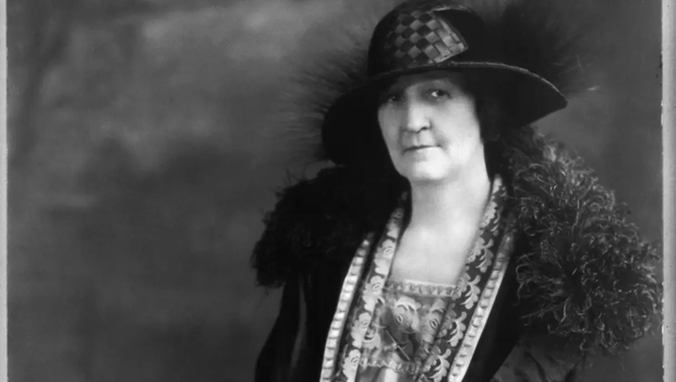 Ma Ferguson portrait balck and white sitting in a chair with hands on lap