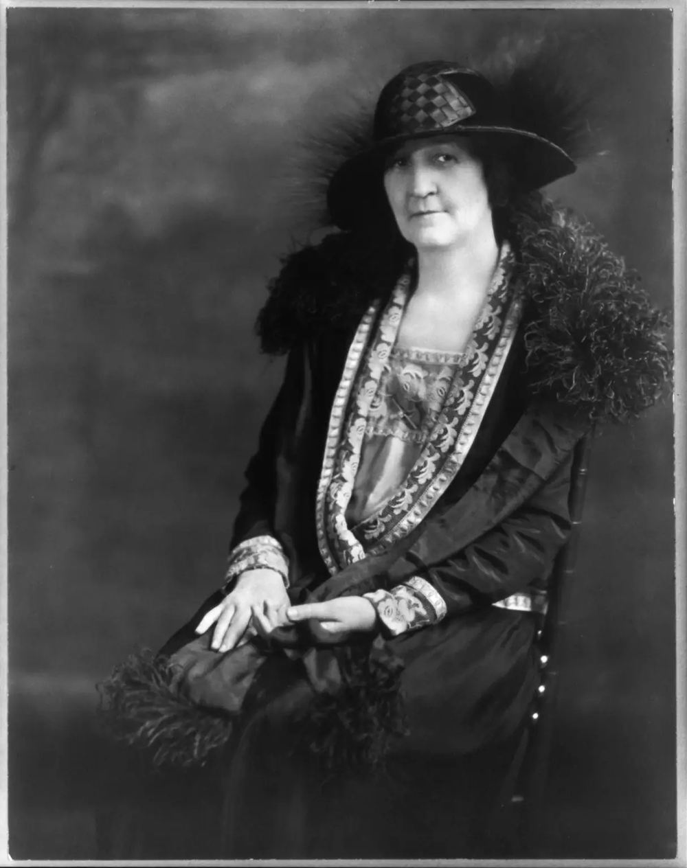 Ma Ferguson portrait balck and white sitting in a chair with hands on lap